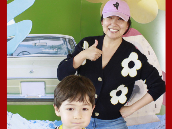 a person and a child posing for a picture