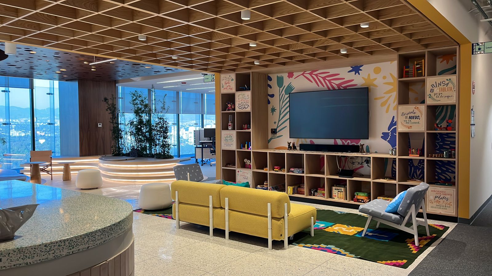 a room with a tv and a large television