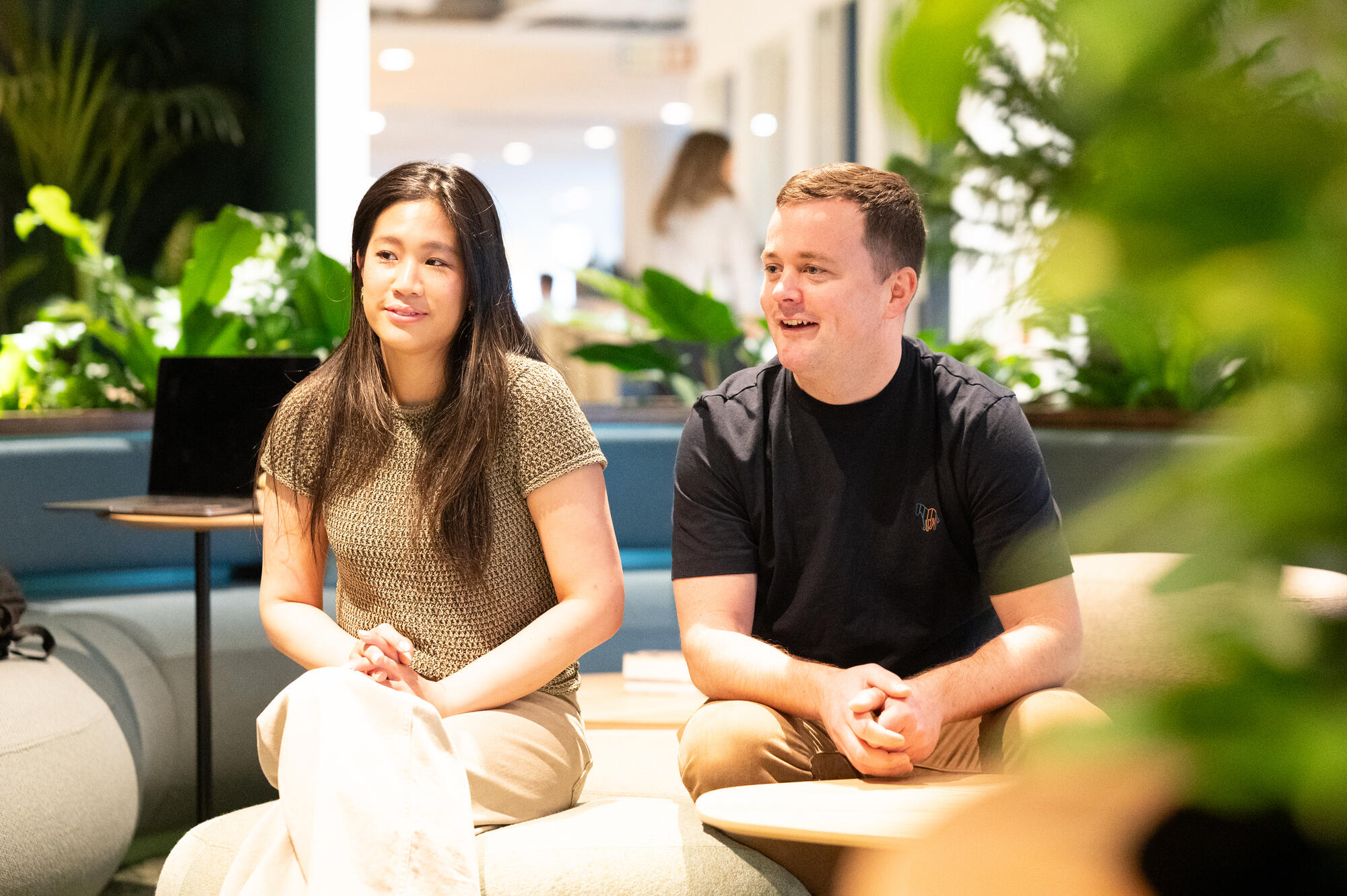 a person and person sitting on a couch