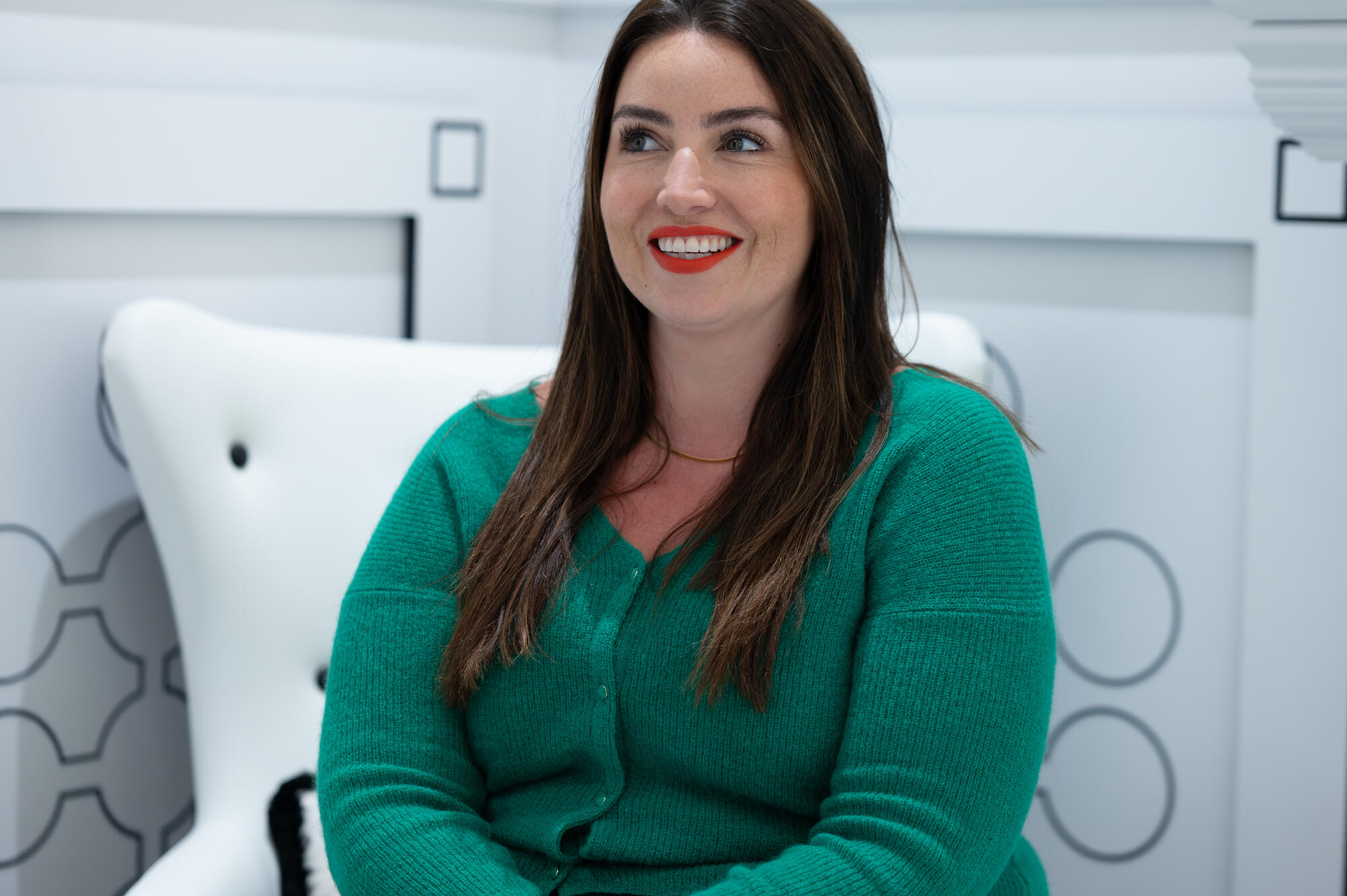 a person in a green sweater