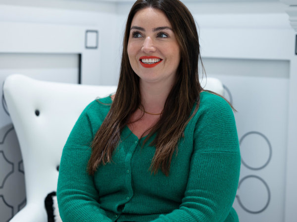 a person in a green sweater