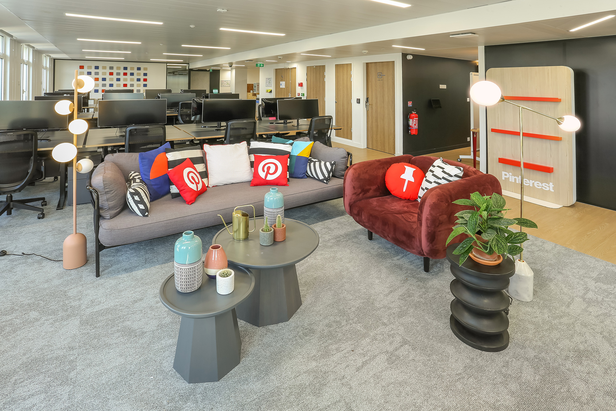 a room with couches and tables