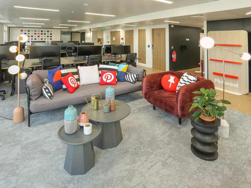 a room with couches and tables