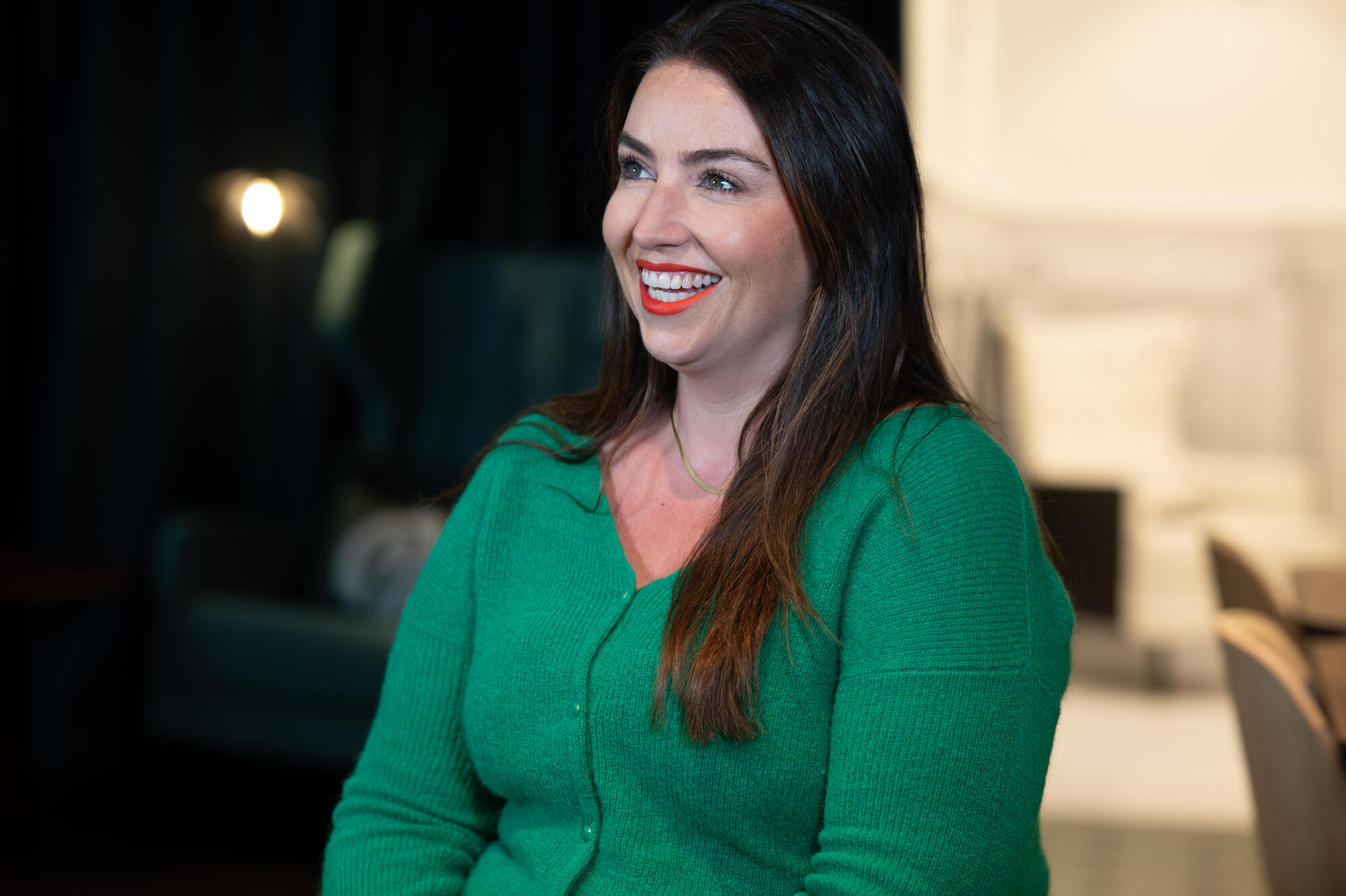 a person in a green sweater