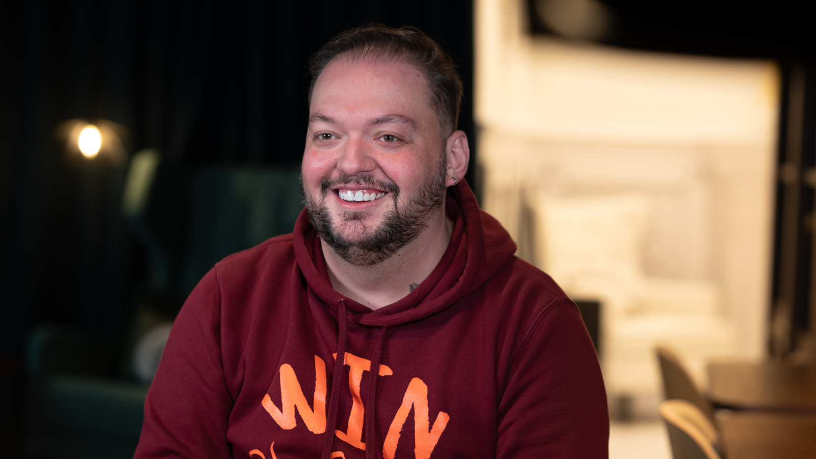 a person smiling at the camera