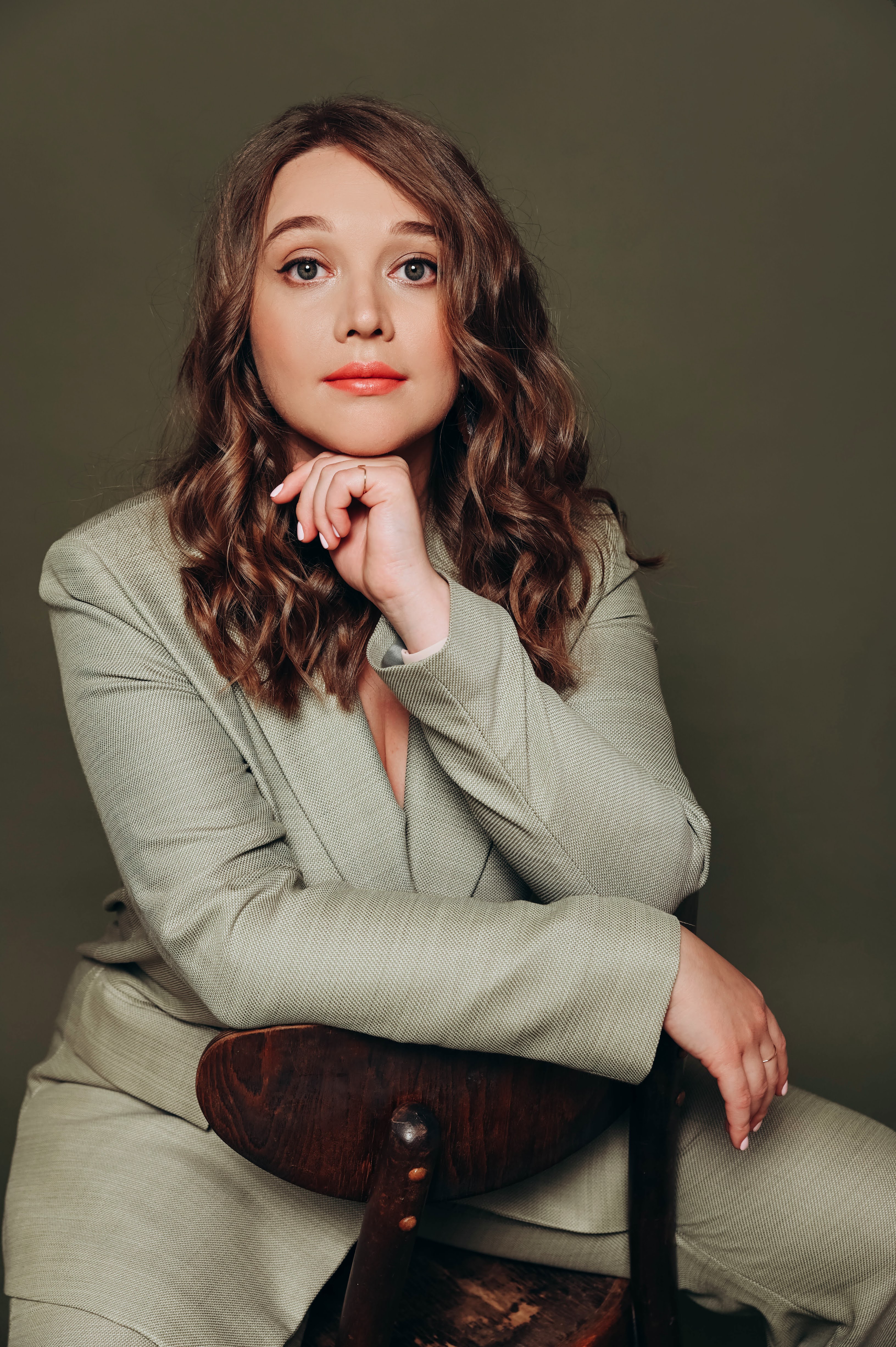 a woman sitting on a chair