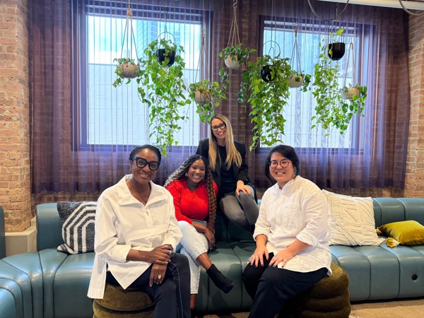 a group of people sitting on a couch