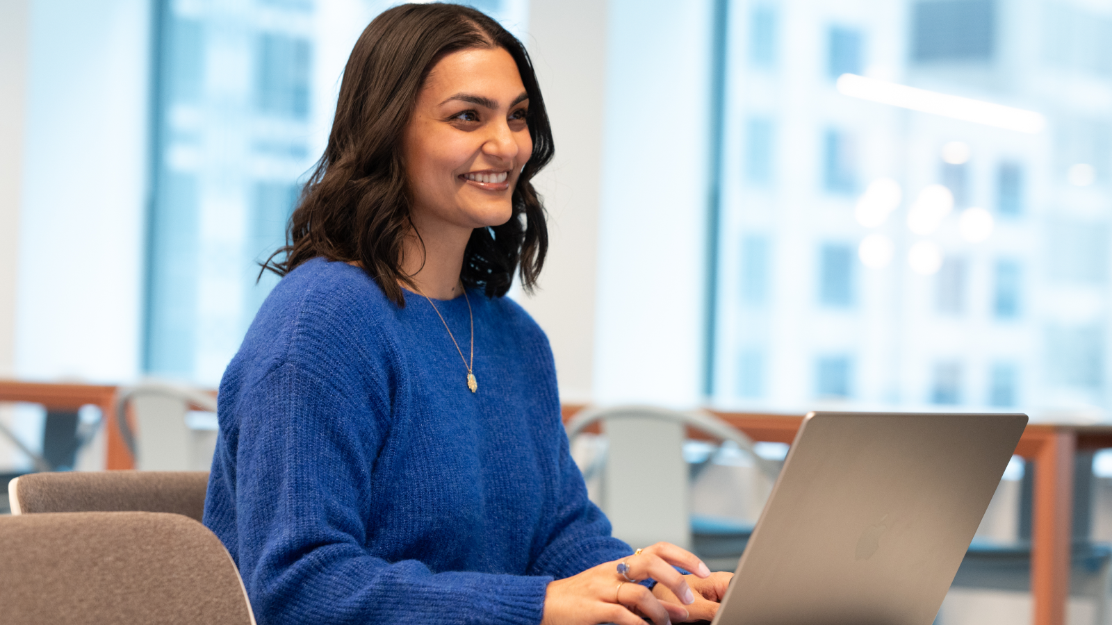 a person in a blue sweater