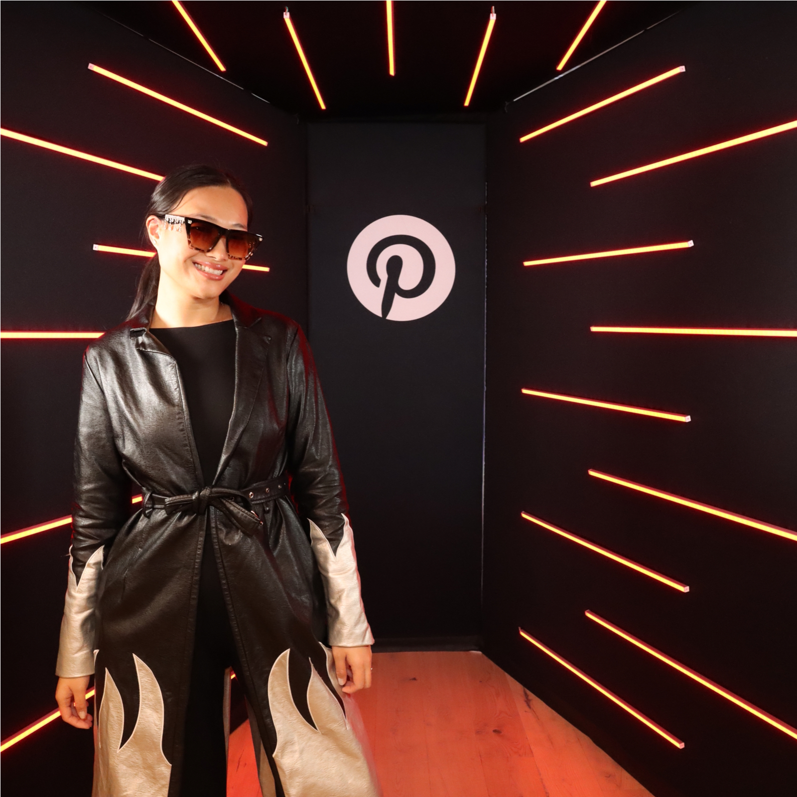 a woman in a black and white coat