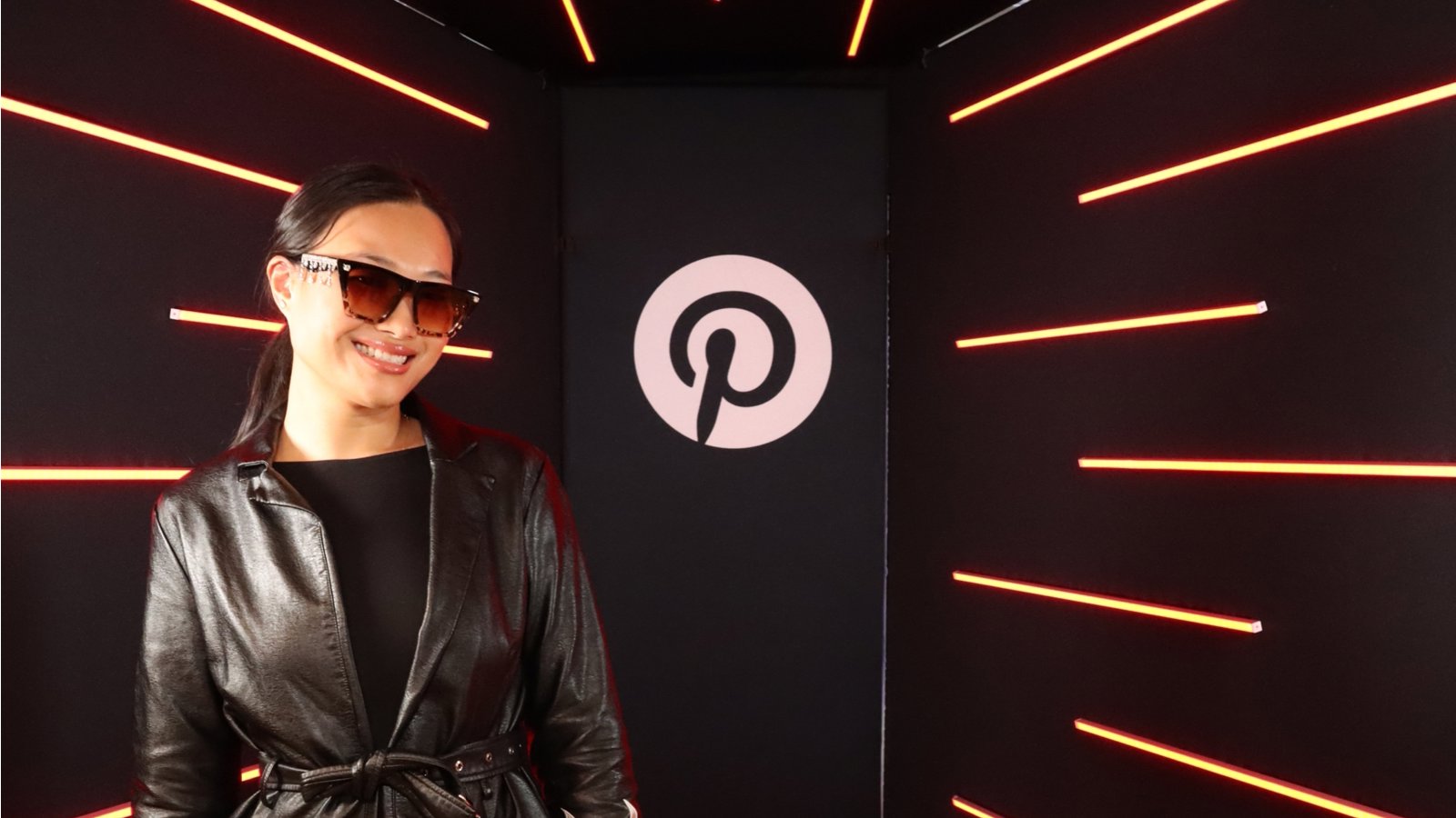 a woman in a black and white coat