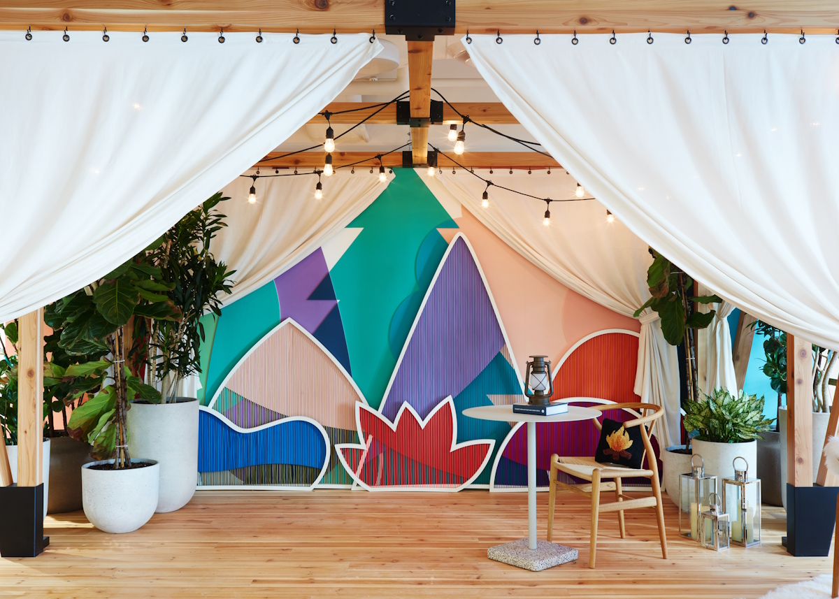 a room with a table and chairs and a table with lights