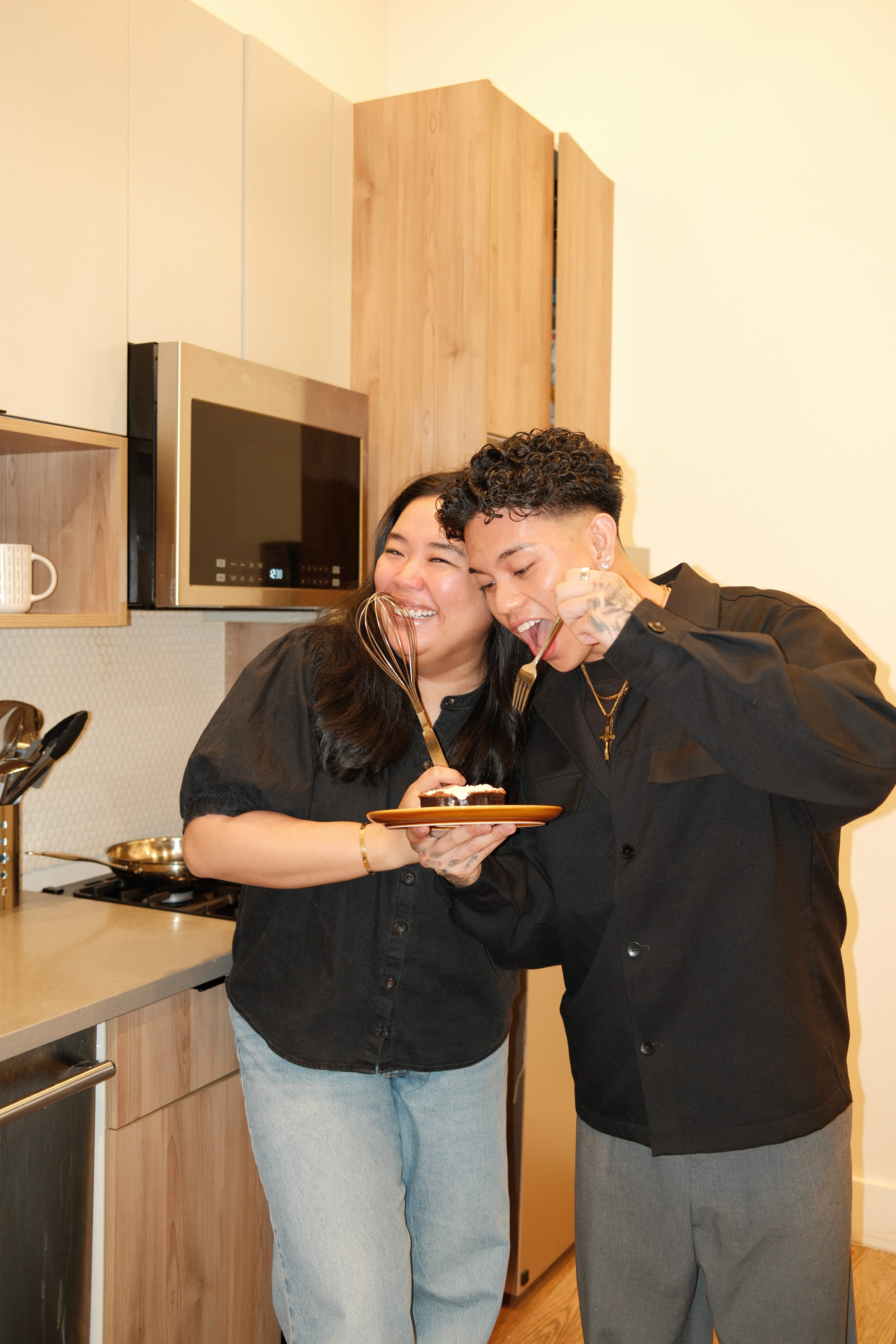 a person and person holding a plate with food