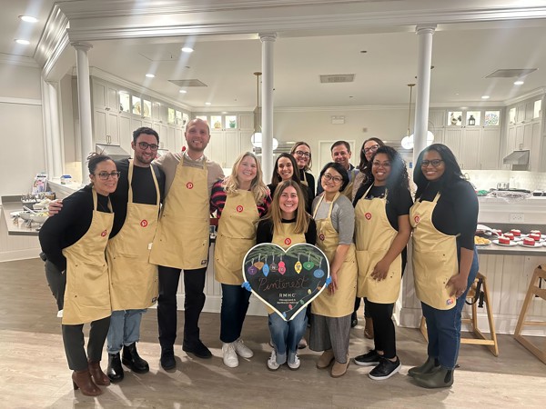 a group of people wearing aprons