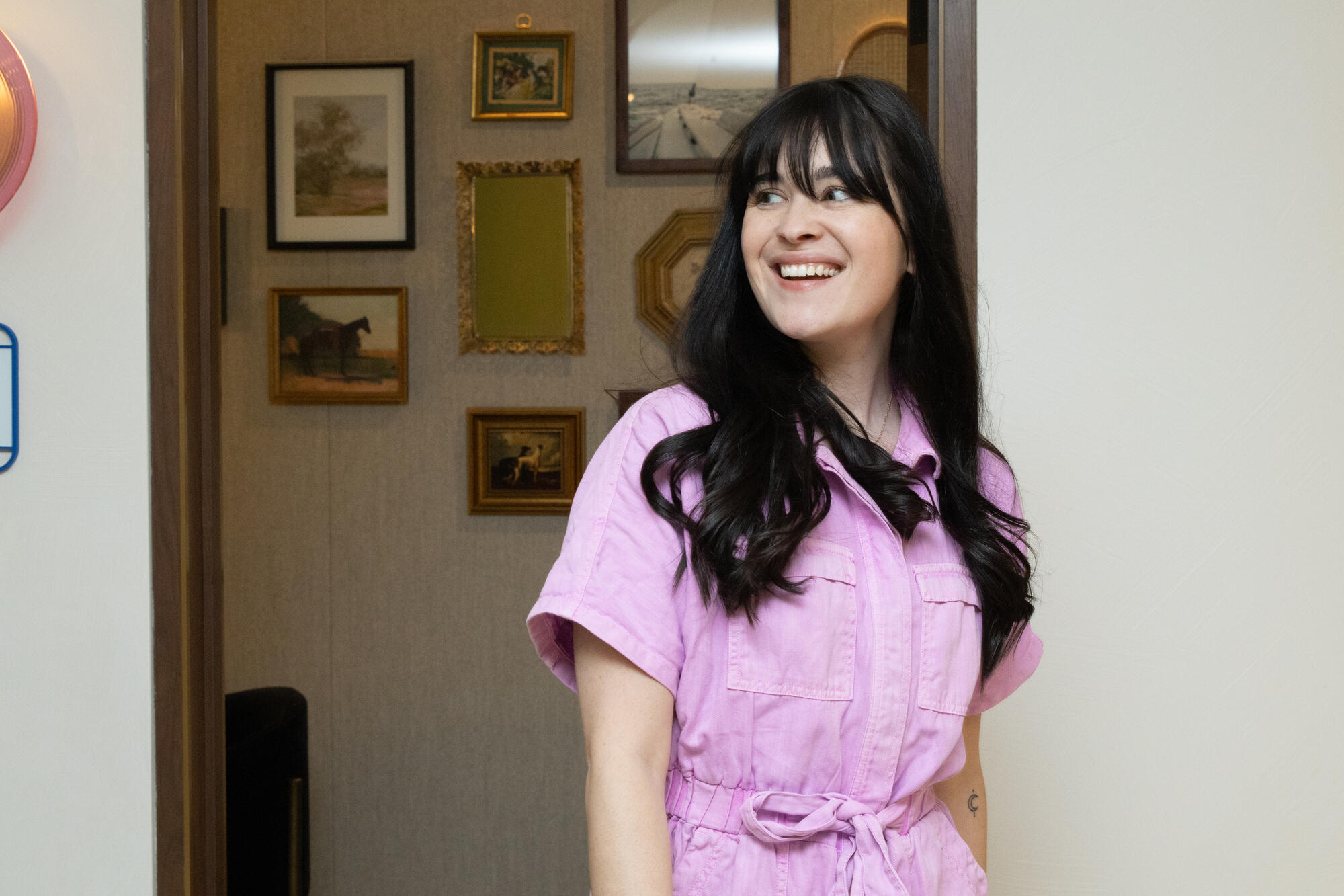 a person in a pink dress