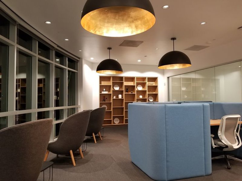 a room with chairs and tables