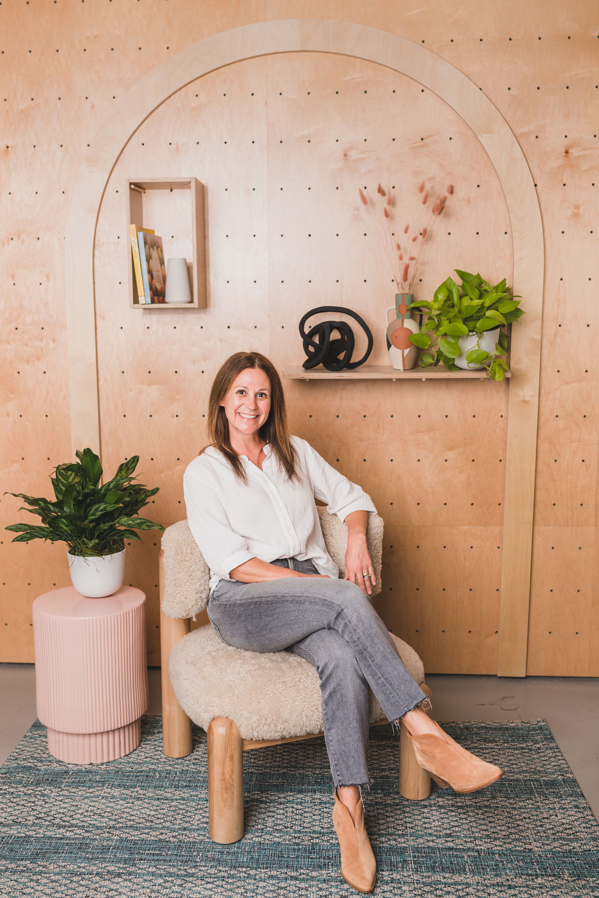 a woman sitting in a chair