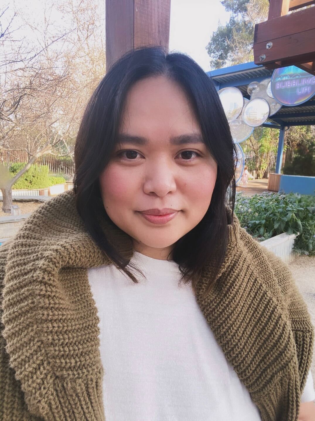 a person smiling for the camera