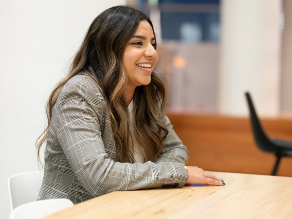 a woman sitting at a table