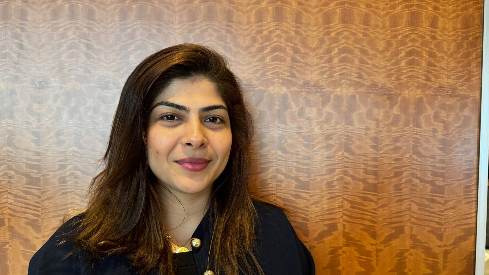 a woman smiling at camera