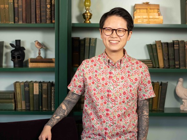 a person with tattoos on their arm