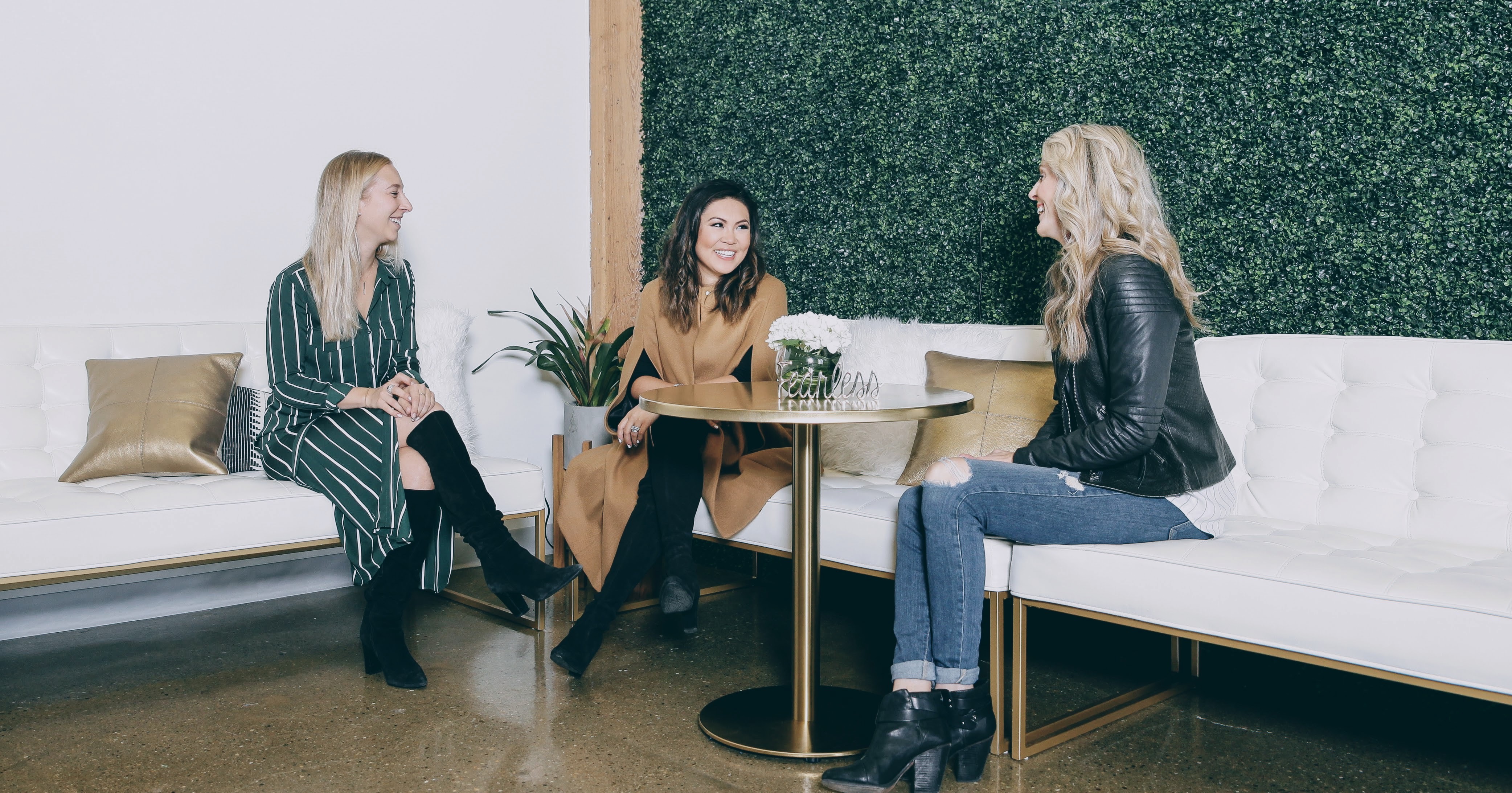 a group of women sitting at a table