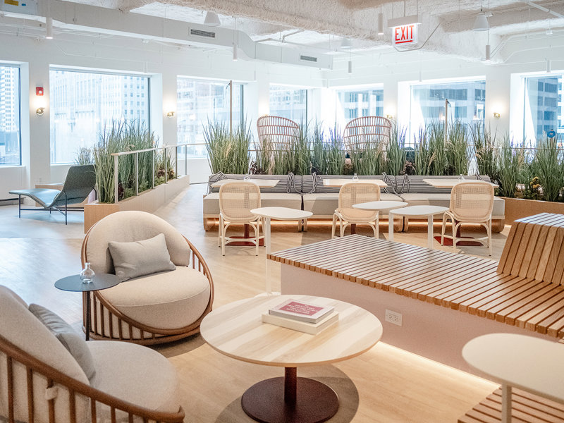 a room with chairs and tables