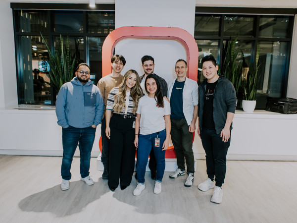 a group of people posing for a photo