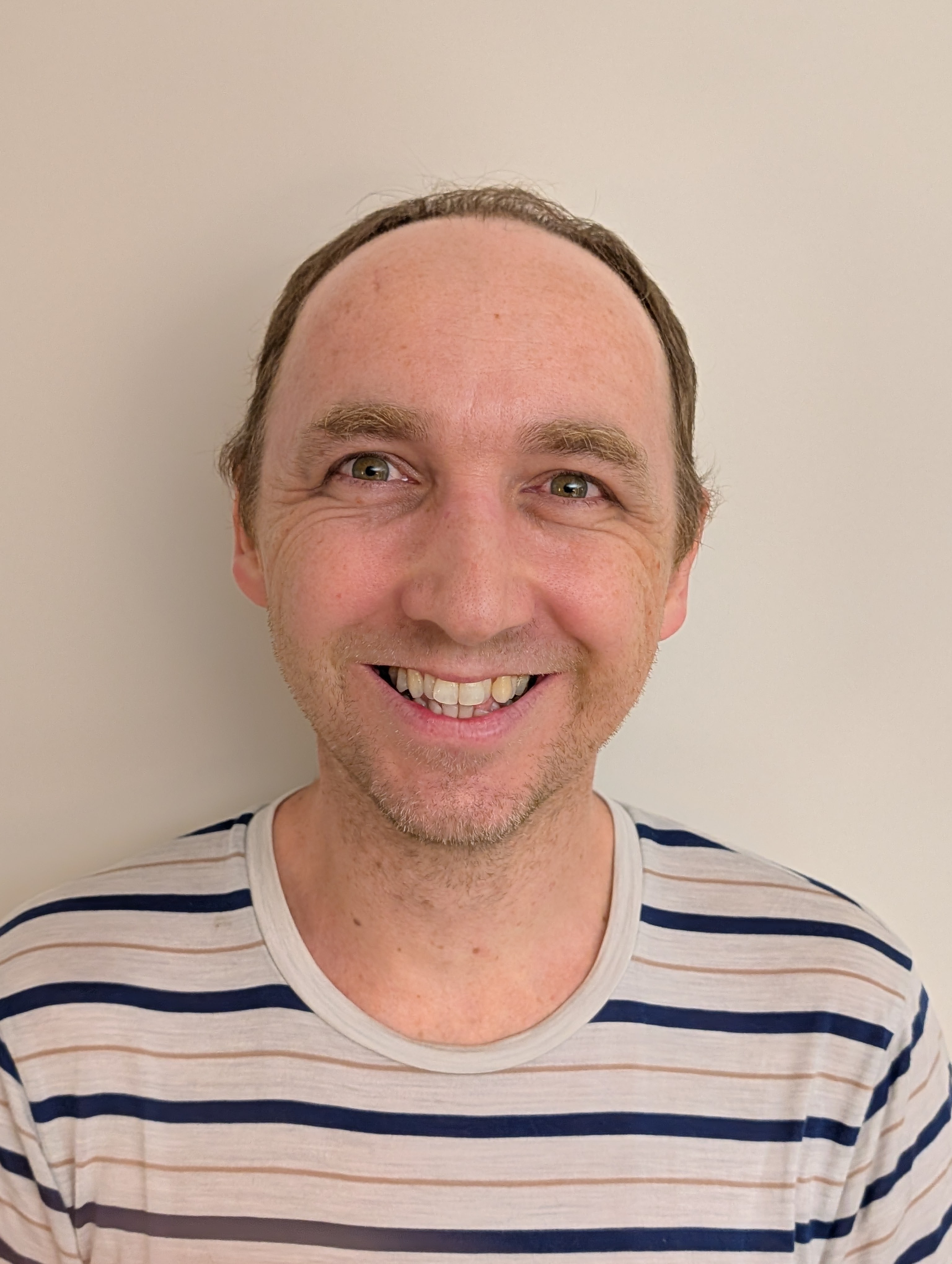 a person smiling for a picture