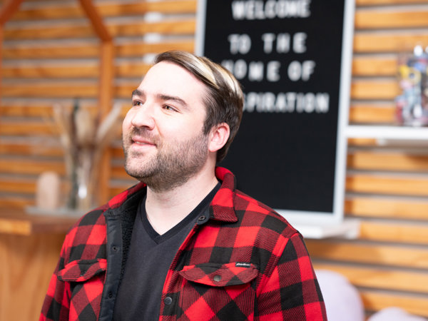 a man in a red flannel shirt