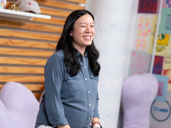 a woman smiling at the camera