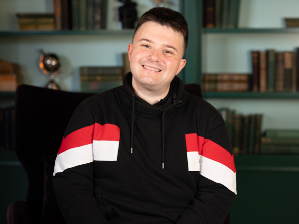 a person smiling for a picture