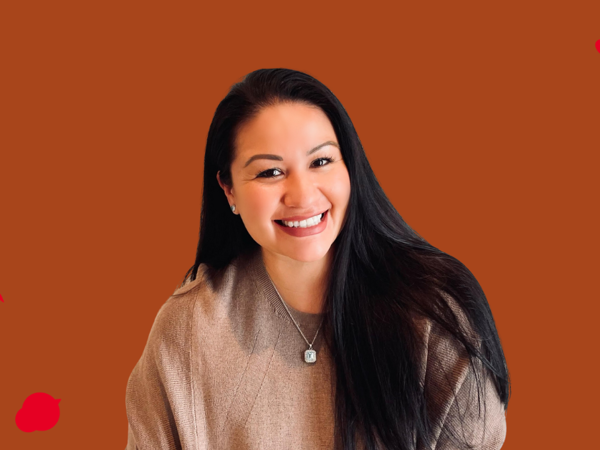 a woman smiling at the camera